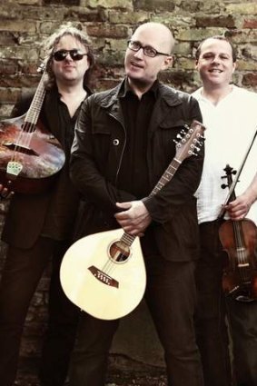 Adrian Edmondson (centre) swapped stand-up comedy for punk songs on folk instruments with Troy Donockley (left) and Andy Dinan.