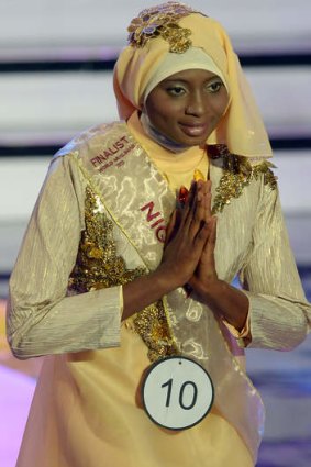 Modest win: Obabiyi Aishah Ajibola from Nigeria is crowned in Jakarta on Wednesday.