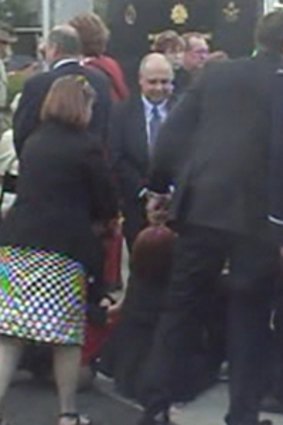 Pressure... Julia Gillard collapses at the service.