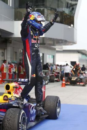 Sebastian Vettel celebrates winning the Malaysian F1 Grand Prix.