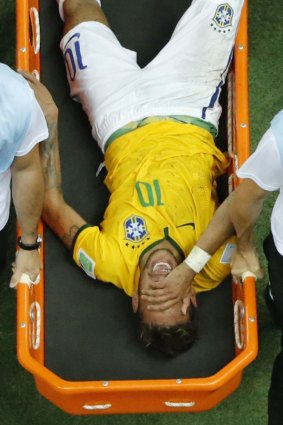 Neymar is stretchered off after suffering the injury