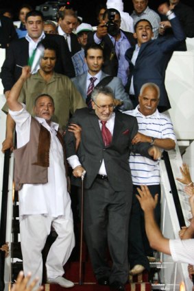 Lockerbie bomber Abdelbaset al-Megrahi arrives in Tripoli.