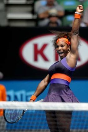 Aced it: Serena Williams celebrates her win over Garbine Muguruza on Rod Laver Arena.