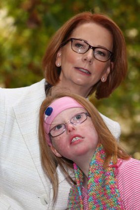 Former prime minister Julia Gillard meets Sophie Dean from the disabled community in May.
