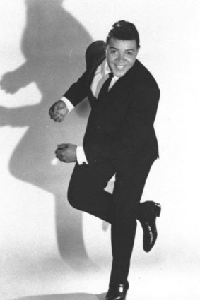 Chubby Checker does The Twist: Like 'putting out a cigarette with both feet'.