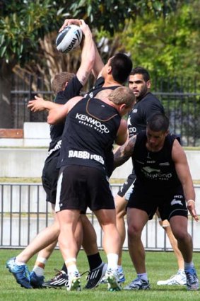 Pack men ... all work and little talk for the Rabbitohs yesterday.