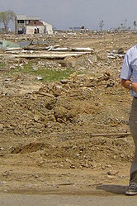 Paul Steinfort stands in the ruins of Banda Aceh after the tsunami struck.