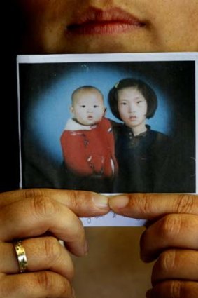 Stunned by the truth &#8230; intercountry adoptee Kim Myung-Soo as a baby with her older sister in Korea.