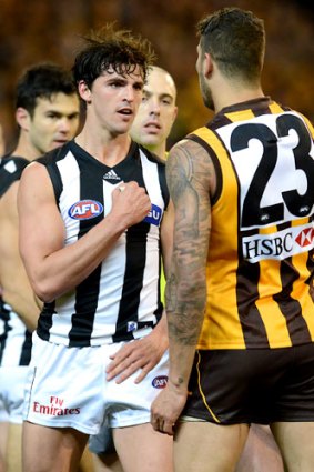 Scott Pendlebury and Lance Franklin size each other up.