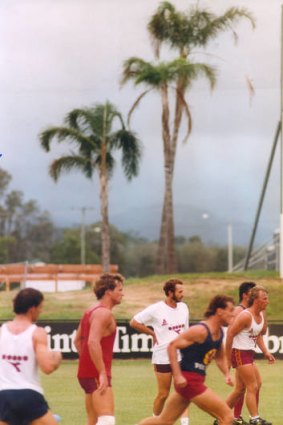 Robert Walls (third from left) leads Bears training at Carrara in 1991.