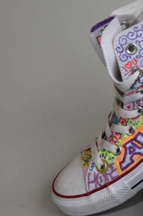A pair of Graffiti Soles shoes.