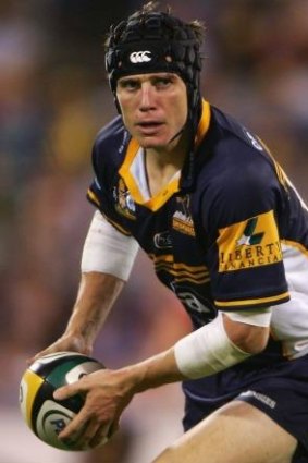 Super Rugby success: Larkham playing for the Brumbies.