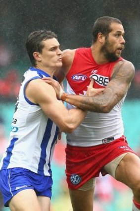 Round two: Scott Thompson competes for the ball against Lance Franklin.