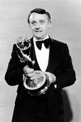Robert Vaughn poses in 1979 with his Emmy Award for outstanding supporting actor for a drama series in Washington Behind Closed Doors. 