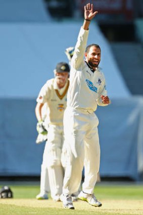 Six-for: Ahmed appeals for LBW against Michael Hogan.