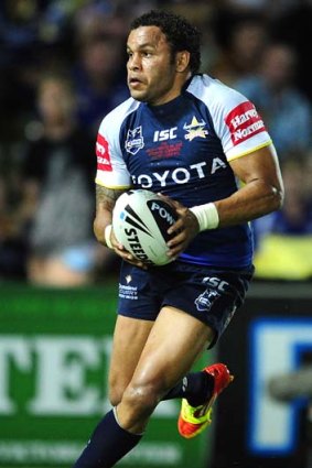 Matt Bowen sets off on another darting run for the Cowboys against the Broncos in Townsville.