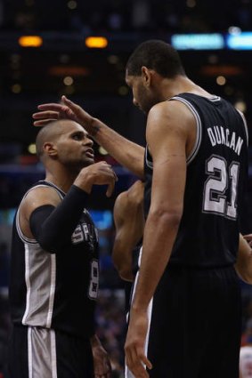 Patty Mills and Tim Duncan were at the forefront of San Antonio's win over Portland.