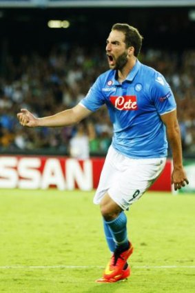 Gonzalo Higuain celebrates his equaliser for Napoli.