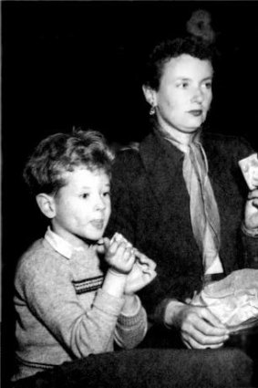 Kim Carpenter as a young boy, watching the opera <i>Tosca</i> with his mother in 1955.