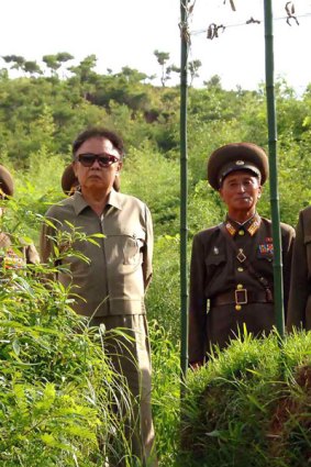 Kim Jong-il visits a North Korean women's army unit.