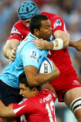 No longer a threat ... Former Waratah Kurtley Beale in last year's round two clash against the Reds.
