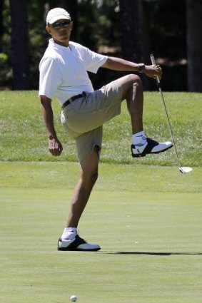 Barack Obama during a round of golf at the Farm Neck Golf Club, Martha's Vineyard, in 2013.