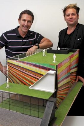 Scott Maidment and Brett Sheehy (left) with hub model.