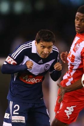 Pablo Contreras competes for the ball with Melbourne Heart's Golgol Mebrahtu during the A-League match between the teams on October 12.