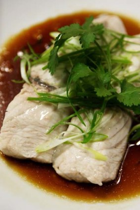 The one dish you must try ... Market fish of the day, steamed and served with a light soy sauce, baby coriander and spring onions, $29.