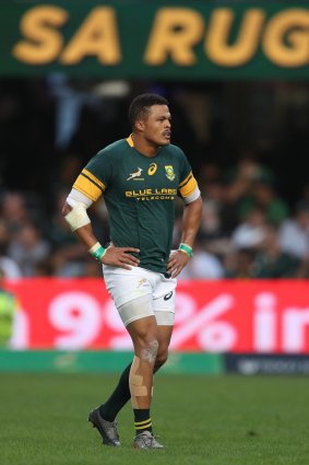 No answer: Juan de Jongh looks on as the All Blacks stormed away to a big away victory.