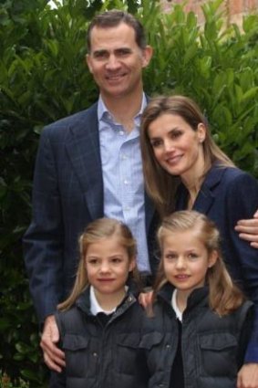 Family affair: A recent  official portrait of Prince Felipe  and Princess Letizia, with their daughters  Leonor and Sofia.
