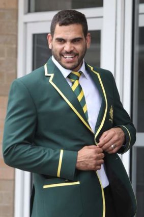 Blazer glory: Greg Inglis suits up for the World Cup on Thursday.