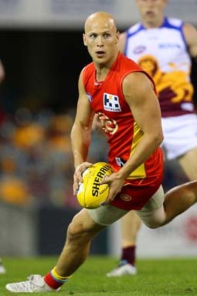 Gary Ablett on the charge for the Suns.