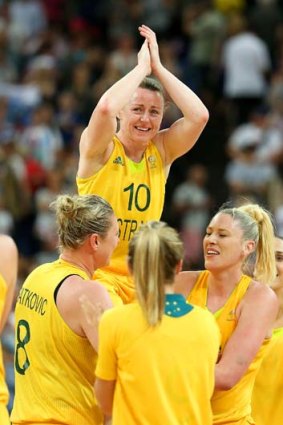 Kristi Harrower is chaired by her teammates at the London Olympics after Australia defeated Russia.