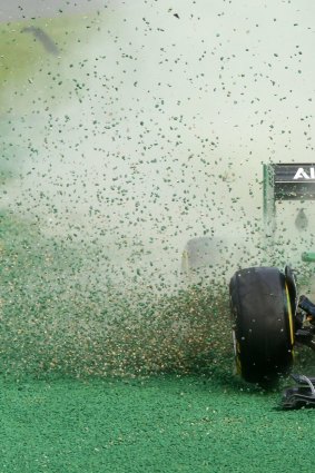 Early casualty: Kamui Kobayashi crashes on the first corner during this year's Melbourne Grand Prix.

