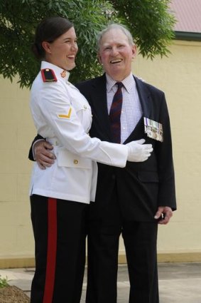 Staff cadet Harriet Pembroke with her grandfather Lieutenant-Colonel Arthur Pembroke who met the Queen again after 58 years.