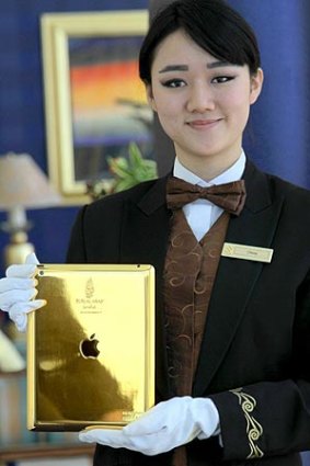 Dubai's Burj al Arab hotel offers a 24-carat gold iPad for guests' use - presumably they don't have to wear white gloves, though.