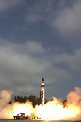 Take off ... India's Agni-V missile launch yesterday.