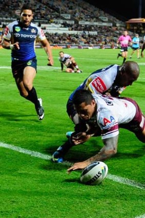 Jorge Taufua of the Sea Eagles scores a try.