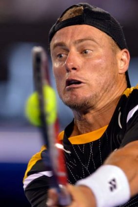 Still fighting: Hewitt was conquered by Tipsarevic.