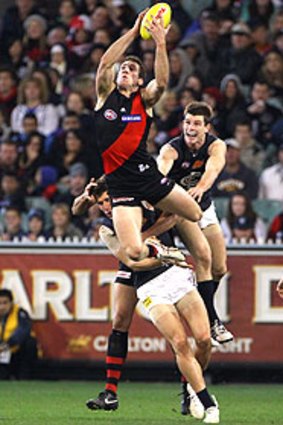 Essendon’s Kyle Hardingham is making a habit of these soaring marks.