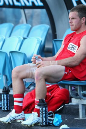 Ben McGlynn after injuring his hamstring against the Crows.