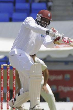 Chris Gayle strokes the ball through the covers during his unbeaten knock of 85.