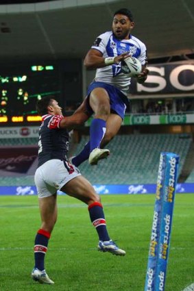 Bargain buy &#8230; Bulldogs recruit Krisnan Inu jumps for a kick which led to a try.