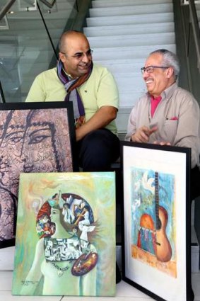 Artists Ossama Boshra (left) and Lofti Abou Sariya.