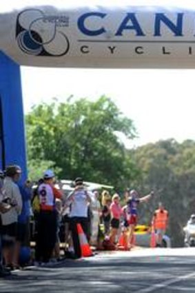 Kimberly Wells wins last year's Tour De Femme women's participation race, which the Canberra Cycling Club fears it may no longer be able to be run.