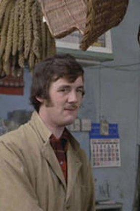 John Cleese with Michael Palin and the famously expired parrot.