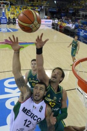 Mexican Hector Hernandez vies with Australia's David Andersen during the Boomers' eight-point World Cup win.