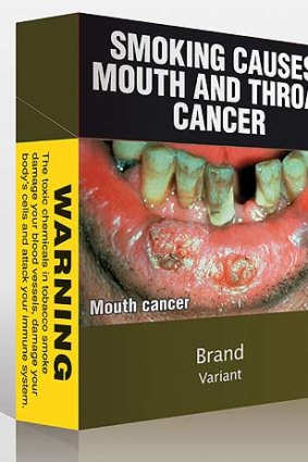 The new proposed cigarette packet style in dark olive-green and plastered with health warnings.