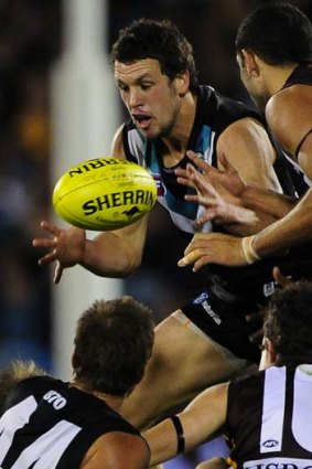 Travis Boak sets a fine example in the Port Adelaide midfield.
